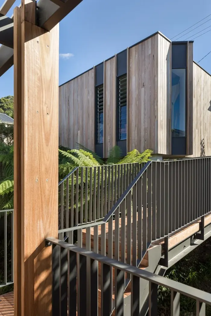 Vertical timber cladding and steel-framed walkway on the Coledale escarpment renovation